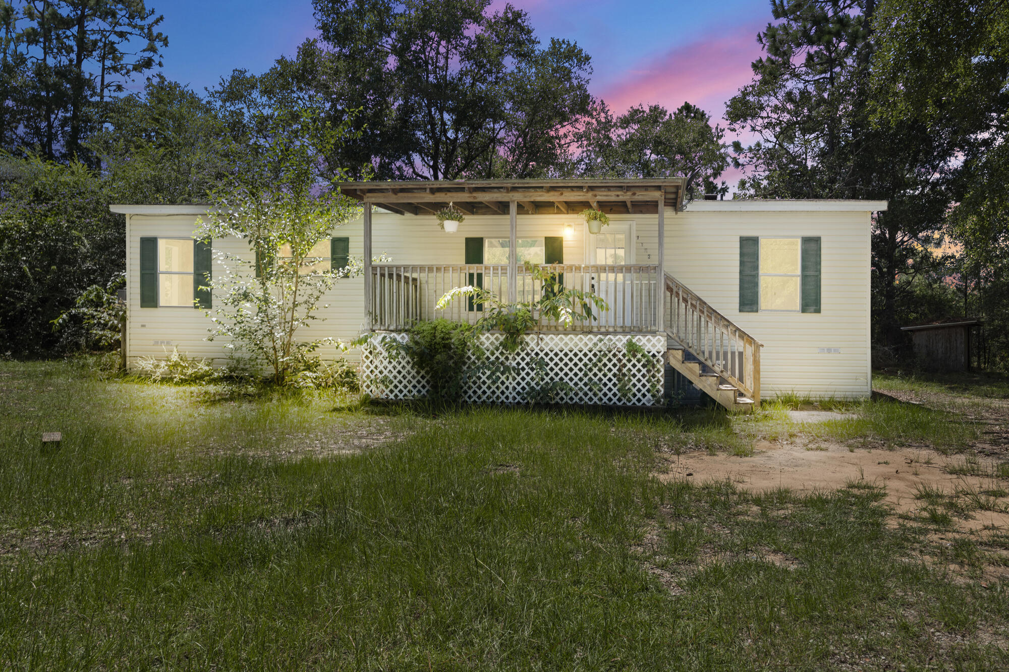 Charming Home on 2.75 Acres - Prime Location Close to TownThis beautiful 3-bedroom, 2-bath home is nestled on 2.75 peaceful acres and located less than 2 miles from the center of town. Enjoy the tranquility of country living with the convenience of nearby amenities.The property features a spacious covered front porch and a large covered back porch--perfect for relaxing or entertaining. Recent updates include: Brand new AC (2025) Fresh interior paint Roof replaced in 2020 Multiple utility/storage buildingsThis is a wonderful opportunity to own a well-maintained home in a quiet, desirable location. If you're looking for space, privacy, and convenience, this property has it all!