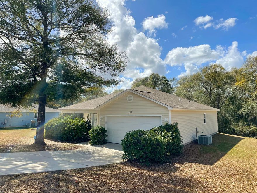 Clean, well-maintained home in a great neighborhood. 3BD/2BA home with 2-car garage. Perfect location with easy access to both Hwy 85 and Hwy 90. Large covered front porch and nice back deck with a view of beautiful trees. Wonderful open concept with split-bedroom floor plan, vaulted ceilings, and walk in closets.  Washer/dryer hook-ups in garage.  Tenants must be non-smoking and have great credit. Pet Restrictions apply