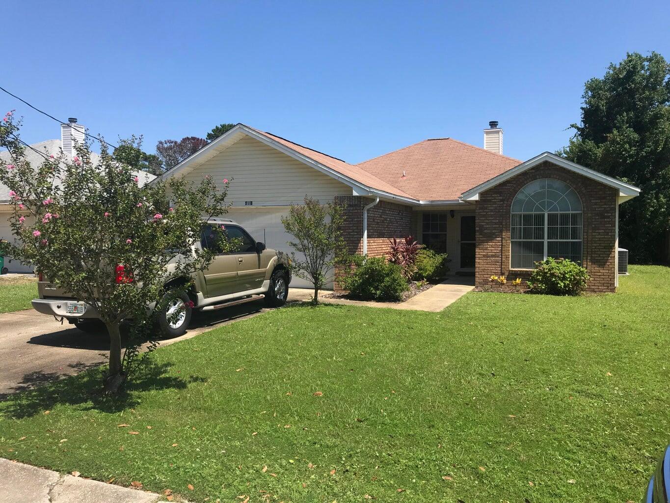 Coming Soon! Great 3 bed/2 bath home with no HOA and just 6 miles to Hurlburt Field. Large, fenced 0.31 acre lot, a 2023 roof, 2 car garage and transferable termite bondSeller is making a few updates with a full interior repaint, new LVP floors and adding an over the stove stainless steel microwave. Photos and available to show by 7/3.