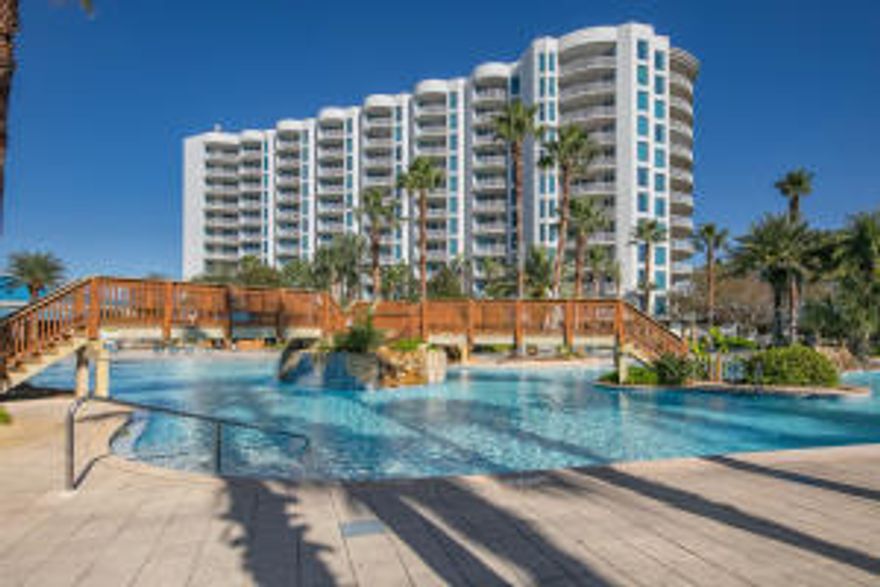 Back on the market through no fault of the seller.. The Palms of Destin Resort and Conference Center is a beautiful, full service resort with amenities galore.  tennis courts, fitness center, on site restaurant, conference rooms, meeting rooms, parking garage and the absolute best courtyard in the city of Destin. large zero entry pool, hot tub, heat capable pool, kids pool, kids splash fountain, palm trees, rock islands with bridges and so much more.  The floorplan has a full size bedroom and a guest room with a trundle bed and private  bath.   the condo comes equipped with washer and dryer, full appliances and fully furnished.  move in ready for you and your family or for your rental guests.  Come see this 9th floor, pool view condominium and see why they sell quickly.  the view is amazin