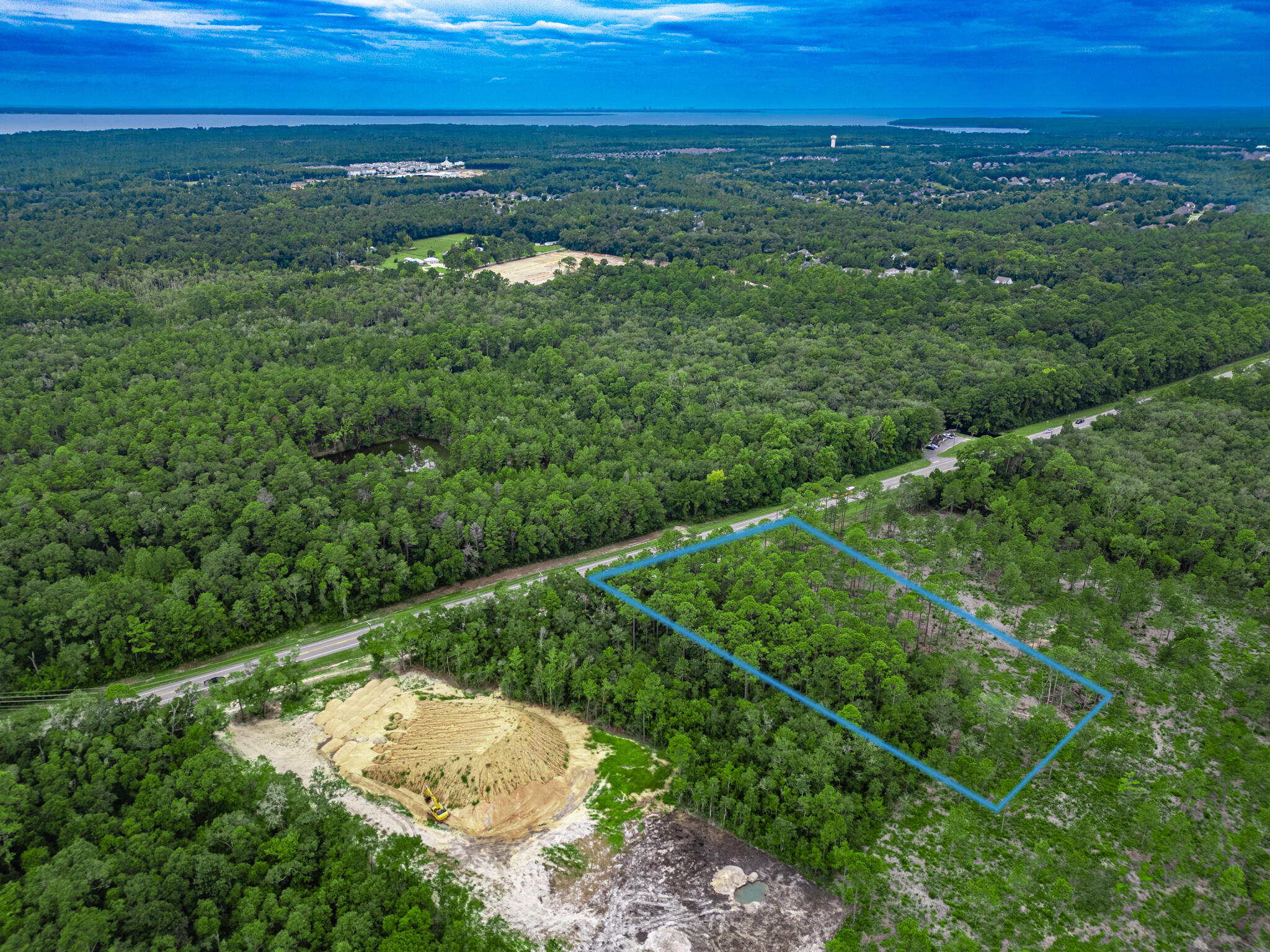 Discover this expansive parcel of vacant land, perfectly positioned and zoned for both residential and neighborhood commercial use, within the City of Freeport. Whether you're looking to build your dream home, develop a business, or do both, this versatile property offers endless possibilities. With its large size and flexible zoning, you have the unique opportunity to create a thriving space that meets both residential and commercial needs. Located in a desirable area, this property is an ideal investment for future growth and development. Don't miss out on this prime piece of land! Only the portion of land above Hwy 20, totaling approximately 1.7 acres, is what is listed for sale.