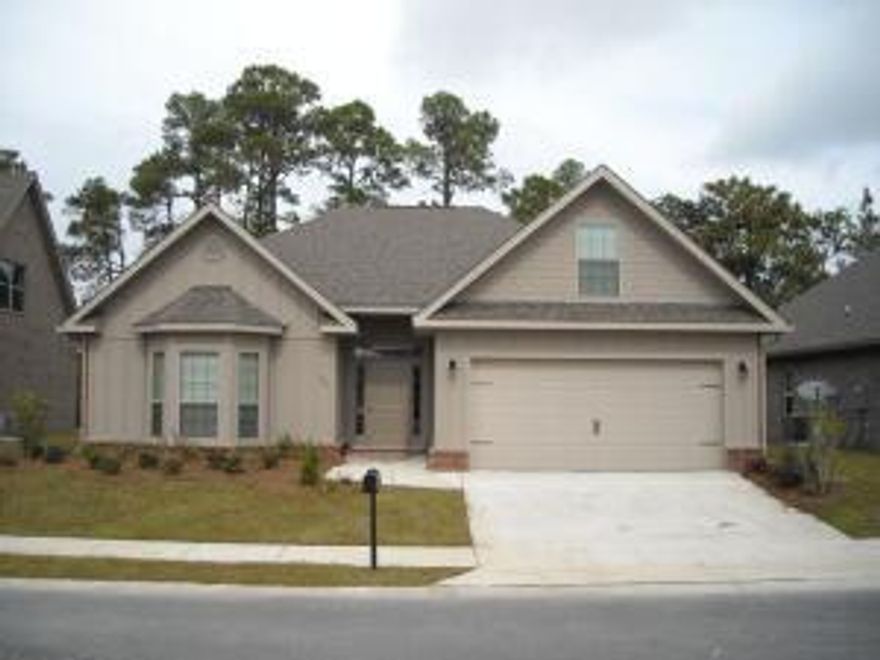 Beautiful 3 Bedroom, 2 Bath house in Whispering Lake. Large open living room, kitchen with granite counter tops and stainless appliances, large dining area, and additional sitting room that leads to backyard patio. The master offers a garden tub, double vanity, granite countertop, tiled shower, and large walk-in closet. Large bonus room over 2 car garage. Tiled through out entire house. Just minutes from the beautiful white sand beaches, grocery stores, area schools, restaurants, golf, shopping and the local hospital