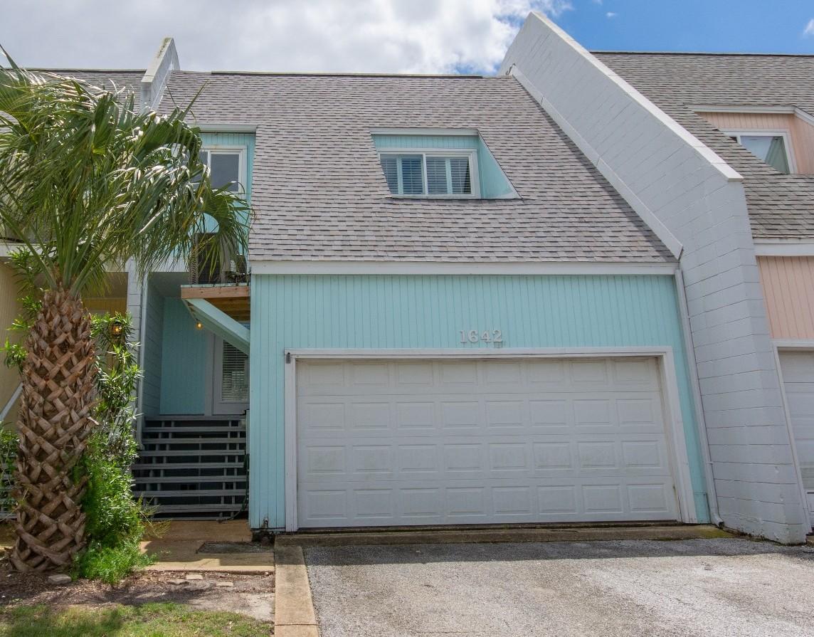 Elegant beauty on Pensacola Beach - lowest HOA fees in the area! The main floor and second floor have been expanded, adding a bonus room over the garage and an office space in the home. You'll stay cool in the summer with 2 HVAC units and warm in the winter by the fireplace. The beautiful kitchen boasts maple cabinets, slab granite countertops, and a gas stove top. In the large master suite there are 2 closets - additional walk in closet in the master bath. Throughout the home you'll find plantation shutters, tile floors, ceiling fans to stay cool, built in bookshelves, balcony in the master suite, a large back deck, and inside laundry. Along with many of the updates, the roof was also replaced and is approximately a year old.