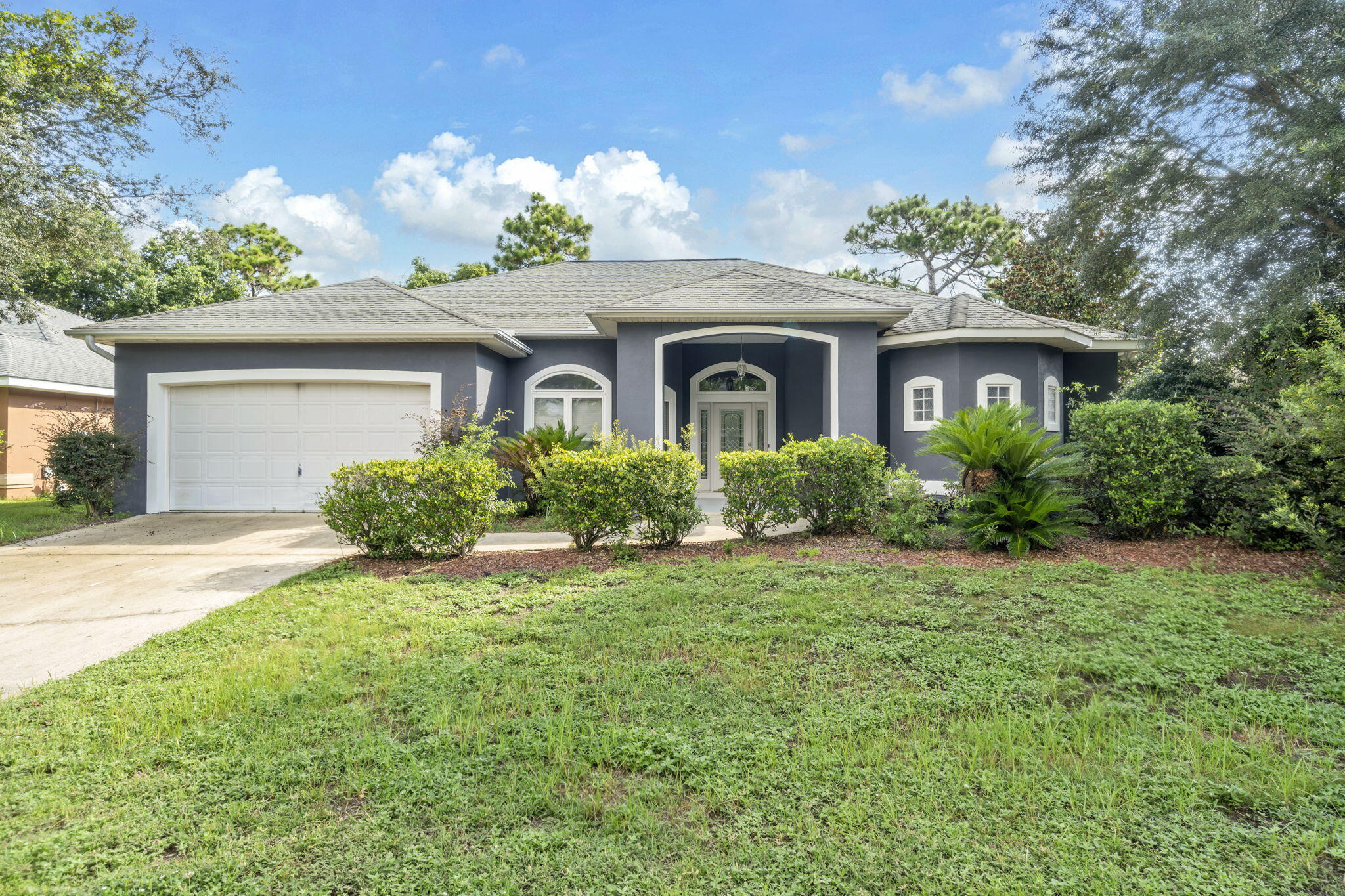 **Pro Photos Soon! CHARDONNAY ESTATES - EASY ACCESS TO DESTIN & EGLIN AFB! All NEW Exterior Paint!! Tucked in a quiet, low-HOA neighborhood w/ top-rated schools, this beautifully maintained 3 BEDROOM / 2.5 BATHROOM home offers the perfect blend of comfort and convenience--just 15 MILES Eglin AFB and 10 MILES TO DESTIN via the Mid-Bay Bridge. 12' ceilings in the living room and den create an open, airy feel, while the SPLIT FLOOR PLAN includes a spacious master suite with a relaxing jacuzzi tub. The granite kitchen counters with stainless appliances flows into a cozy den with a gas fireplace, and the SCREENED-IN PATIO is the perfect spot to unwind year-round. Roof 2015, HVAC & WH 2018. Walk to the Choctawhatchee Bay for fishing, sunsets, or beach time. Schedule your private showing today!