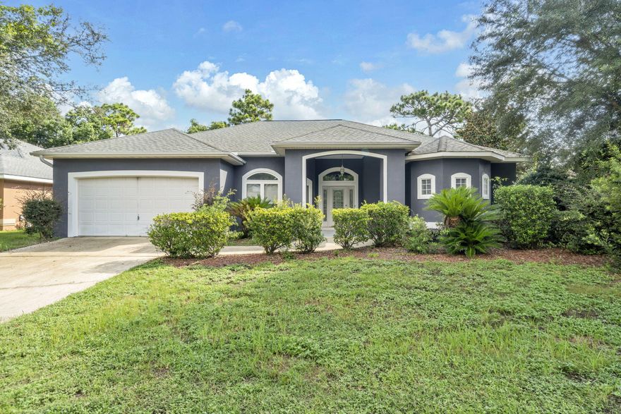 **PRICE REDUCED $20,000** CHARDONNAY ESTATES - EASY ACCESS TO DESTIN & EGLIN AFB! All NEW Exterior Paint!! Tucked in a quiet, low-HOA neighborhood w/ top-rated schools, this spacious 3 BEDROOM / 2.5 BATHROOM home offers the perfect blend of comfort and convenience--just 15 MILES Eglin AFB and 10 MILES TO DESTIN via the Mid-Bay Bridge. 12' ceilings in the living room and den create an open, airy feel, while the SPLIT FLOOR PLAN includes a spacious master suite with a relaxing jacuzzi tub. The granite kitchen counters with stainless appliances flows into a cozy den with a gas fireplace, and the SCREENED-IN PATIO is the perfect spot to unwind year-round. Roof 2015, HVAC & WH 2018. Walk to the Choctawhatchee Bay for fishing, sunsets, or beach time. Schedule your private showing today