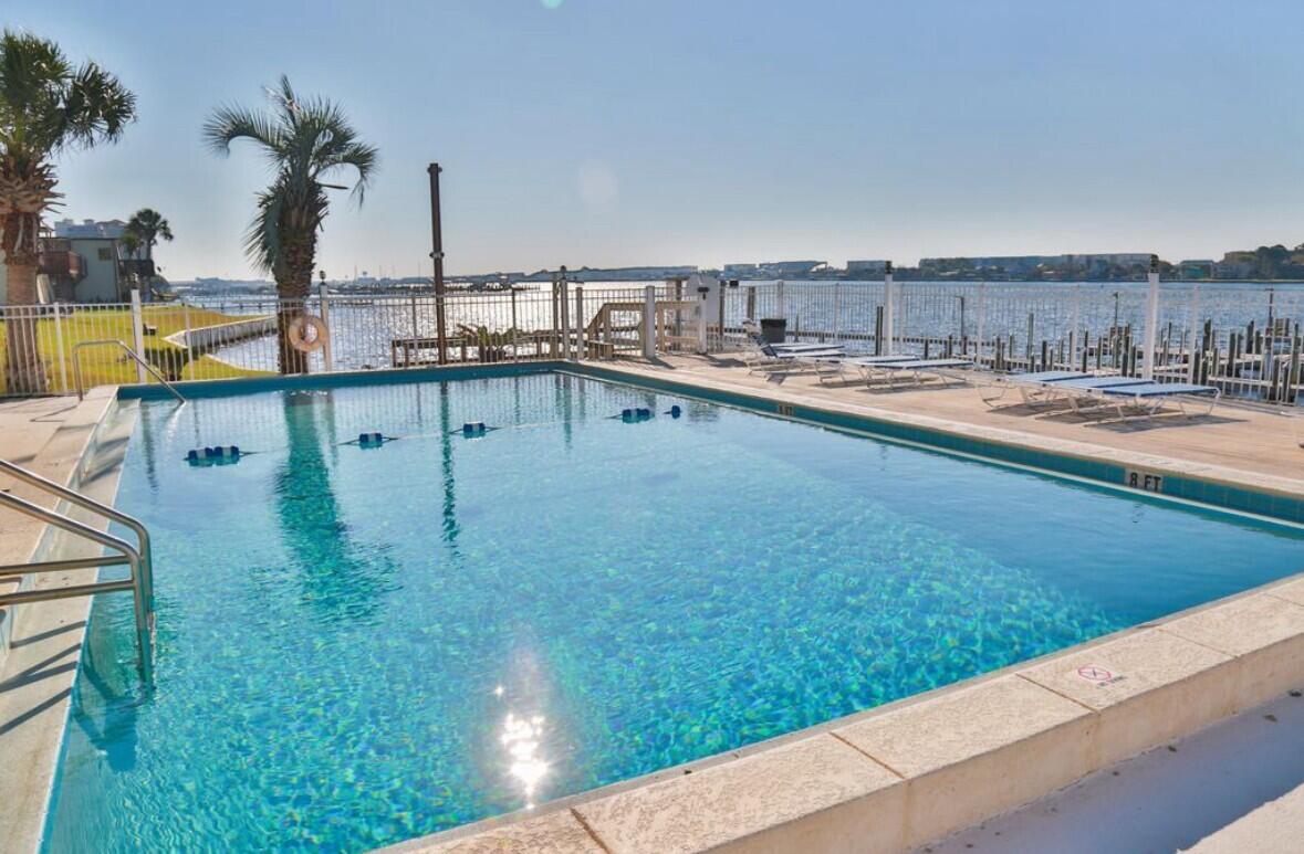 This beautifully updated condo in Fort Walton Beach offers the perfect blend of modern comfort and waterfront living. The HVAC system has been replaced, adding to the comfort of this well-maintained unit. Whether you're seeking a primary residence or an investment opportunity, this turnkey condo is ready to go. The community amenities are second to none: unwind by the water in the expansive lounging area, cool off in the sparkling pool, play a match on the tennis court, or host gatherings in the clubhouse complete with a full kitchen. Outdoor enthusiasts will appreciate the optional boat slips, kayak racks, and convenient boat launch. The HOA fees cover water, sewer, trash, grounds maintenance, and building repairs, making for easy,