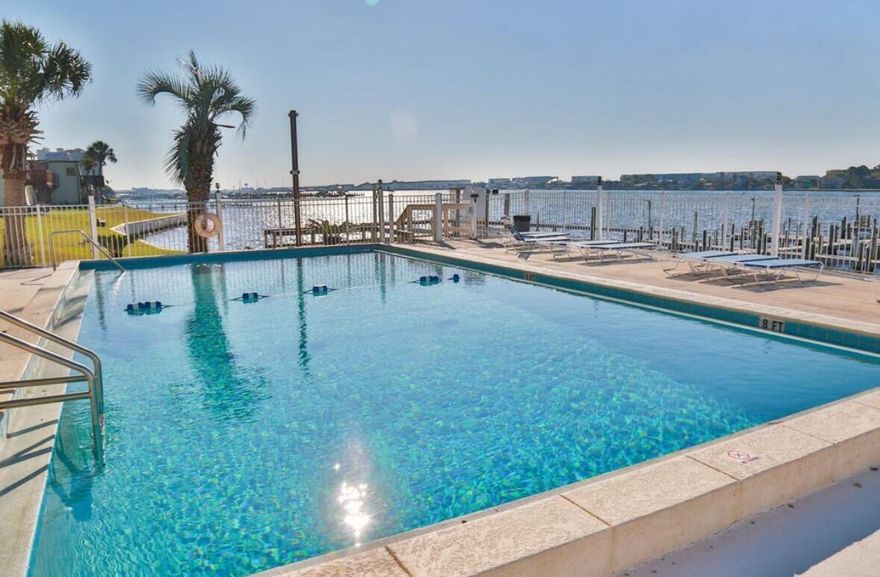 This beautifully updated condo in Fort Walton Beach offers the perfect blend of modern comfort and waterfront living. The HVAC system has been replaced, adding to the comfort of this well-maintained unit. Whether you're seeking a primary residence or an investment opportunity, this turnkey condo is ready to go. The community amenities are second to none: unwind by the water in the expansive lounging area, cool off in the sparkling pool, play a match on the tennis court, or host gatherings in the clubhouse complete with a full kitchen. Outdoor enthusiasts will appreciate the optional boat slips, kayak racks, and convenient boat launch. The HOA fees cover water, sewer, trash, grounds maintenance, and building repairs, making for easy,