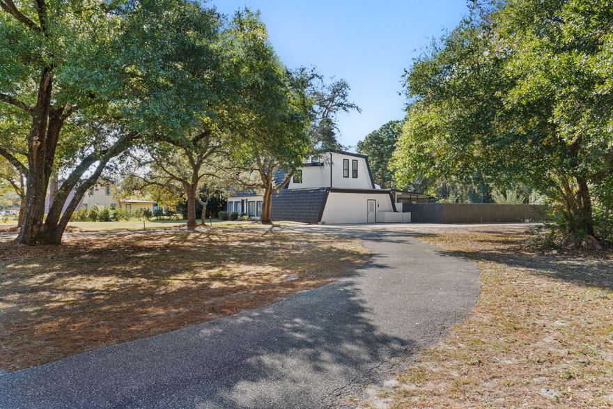 Welcome to 2121 Mar Mar Lane, a fully furnished and beautifully updated home situated on over an acre of private land in Navarre. Currently operating as a successful short-term rental, this turnkey property is also perfectly suited as a full-time family residence.Recent upgrades include a new refrigerator and stove, resurfaced saltwater pool, yard restoration with tree removal, leveling, and new sod, built-in owner's closet, converted garage-to-game room, new well bladder and pump for the geothermal system, new sprinkler pump, and updated light fixtures throughout most of the home. The main level features a spacious primary bedroom with ensuite bath, an office with sleeper sofa, living room and dining room with a see-through wood-burning fireplace, an updated kitchen, laundry room, and a large game room.

The second floor offers a bedroom with two queen beds and a sitting area.

The upper level includes a bedroom with a king bed, a bedroom with a custom built-in double bunk plus two additional full beds, and a full bathroom.

Outdoor living includes a screened lanai overlooking the pool, a side patio with grill, a clubhouse, and two storage sheds. The resurfaced pool and refreshed landscaping create a private fenced in backyard retreat with plenty of room to relax or entertain.

With its flexible layout, extensive updates, and fully furnished convenience, this property is ideal for investors seeking a proven income-producing rental or families looking for a move-in-ready home with space and privacy. Homes with this level of versatility and acreage are raredon't miss the opportunity to make this one yours.