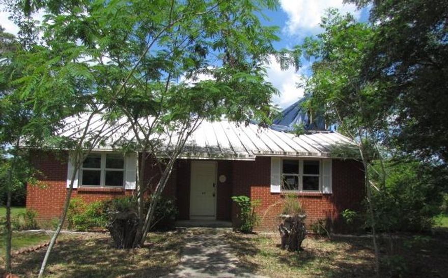 Country living off Hwy 2 with 5.63 Acres just miles to Ponce de Leon; here is an REO property that needs work but could be a great property for somebody wanting elbow room! This 3 bedroom, 1 bath room has great curb appeal. The living room is open a good size with a fireplace and the kitchen is open to a dining or breakfast area. There is an attached carport at the back of the house that has rooms that would be ideal for storage or work shop areas. Buyer to verify all pertinent information as to satisfy themselves. This property is being sold 'as is'.