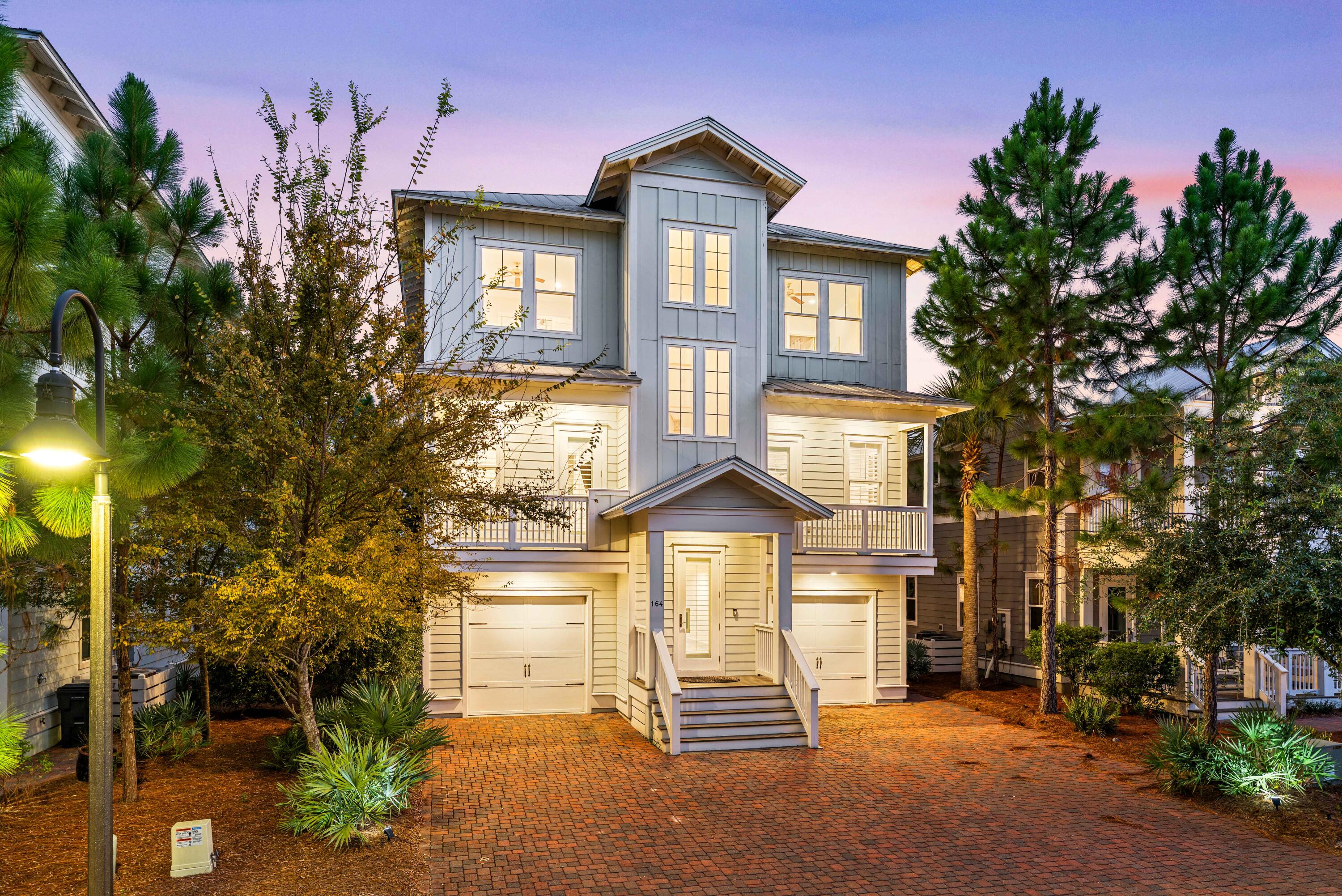Welcome to the largest and only available Key Largo plan available in the desirable community of Prominence, South of 30A. Built in 2017, This coastal elegant home boasts 4,243 sqft showcasing 6 bedrooms, 6 bathrooms, 2 car garage, multiple covered decks, and a custom oversized driveway. The kitchen features custom white cabinetry, with soft closed doors, under the cabinet lighting, stainless steel appliances, quartz countertops, an expanded walk-in pantry, a large island, and stainless steel sink. This home is grandfathered in for a private pool in the backyard. Exceptional craftsmanship and finishes can be seen throughout the house including crown moulding, shiplap, 8 ft doors, 10 ft ceilings, hurricane impact doors, hurricane impact windows, and tankless water heaters. Strong Rental Potential up to $200K per year. Never been rented and offered fully furnished. A private elevator opens to all 3 floors for easy accessibility. HOA includes landscaping, beach shuttle, security, resort style pools and bbq area, and gym. A short stroll over to The Big Chill 30A, where you'll find a variety of entertainment, restaurants, shops, and more. This home is one of a kind and won't last long.