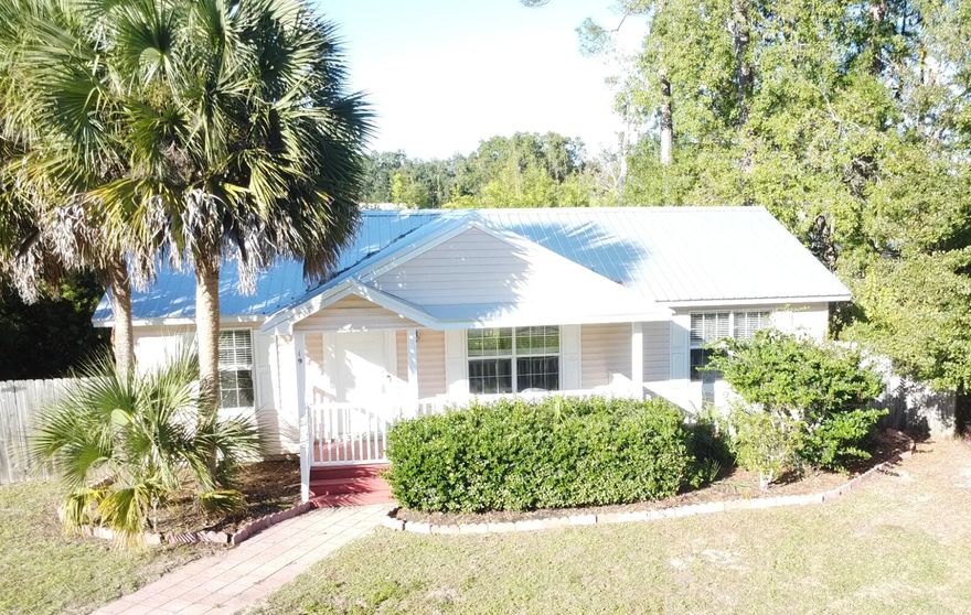 Upgrades and a New Roof in a Prime Santa Rosa Beach Location! Just 2 miles from award winning South Walton Beaches and Dune Lakes, this 3BR/2BA home blends style, comfort, and convenience. Sidewalks are being added along the parkway for easy access to Plantation Way and nearby amenities. Inside, enjoy mosaic tile accents, large format flooring, and a chef inspired kitchen featuring granite with rounded edges, custom soft close hardwood cabinets, stainless double oven, subway backsplash, under cabinet lighting, and a prep island with sink. The primary suite offers built in cabinetry, a walk in closet with wood shelving, and a spa style shower with pebble stone flooring and body jets. Brand new roof installed ready for peace of mind! Minutes from the beach, bay, and boat ramp.