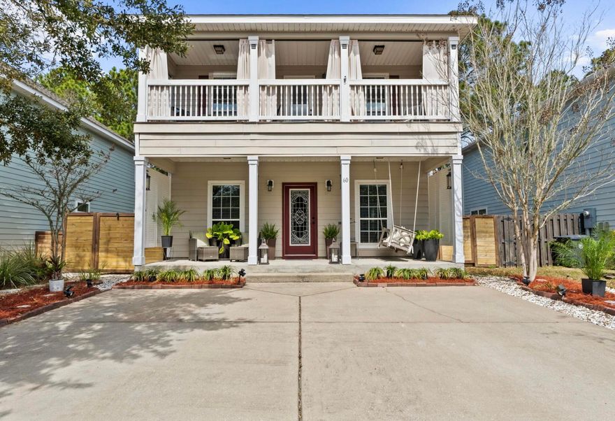 Located in the charming community of Mosaic Oaks in Santa Rosa Beach, this coastal home offers smart functionality, generous storage, and one of the largest backyards in the neighborhood - all with an ultra-low $50/month HOA. Classic double covered porches define the exterior and create timeless coastal charm. Inside, engineered hardwood floors and calming hues complement the open-concept design. The kitchen offers granite countertops, a spacious breakfast bar, expanded pantry and effortless flow into the dining and living areas. Upstairs, you'll find the guest bedrooms, a hall bath, and a spacious primary suite with a glass-enclosed tiled shower and private access to the second-floor balcony. Situated on an exterior lot, this private backyard retreat features an expansive wood deck surrounded by lanterns and creates an inviting setting for entertaining or quiet evenings under the trees. 
Enjoy the best of coastal living from Bay to Beach. Just minutes to Choctawhatchee Bay access at Kellogg Bayside Park and Cessna Landing for paddleboarding, kayaking, and boating, and only 10 minutes to Ed Walline Public Beach Access and Gulf Place along Scenic Hwy 30A -- placing South Walton's beautiful beaches, local dining, and boutique shopping within easy reach.
