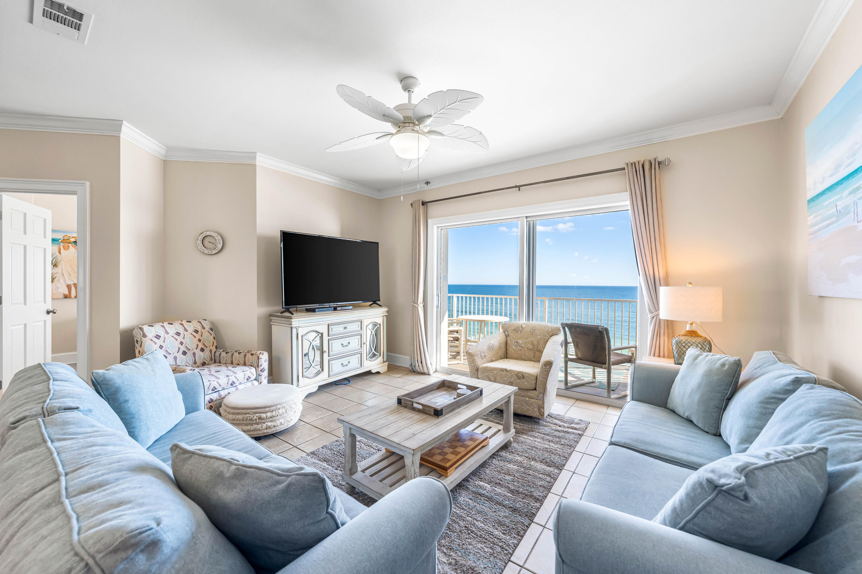 Indulge in spectacular Gulf of Mexico vistas from the 5th floor balcony of this immaculate 3BR/3BA beachfront residence in Crystal Dunes Condominiums located in the heart of Crystal Beach mere minutes from all your favorite Destin hotspots. The minimal maintenance and accommodating design of this home promotes simple living where your only concerns are whether to lounge at the dedicated beach access or by the sparkling community pool. The open dining and living spaces lead directly to the large beachfront balcony while the kitchen features ample custom cabinetry, a wraparound island with bar seating, and stainless steel appliances. Tile floors throughout make it easy to clean up after days spent on the sand while neutral paint colors are highlighted by crown molding along the airy
