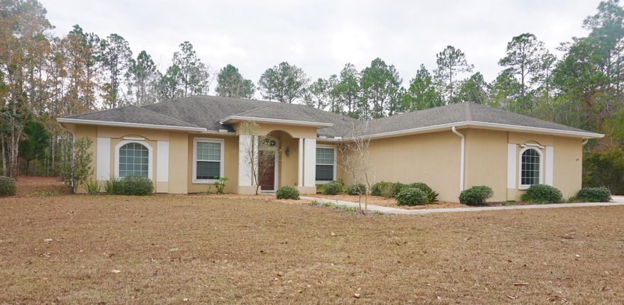 Bring your toys, ample space to park your boat or RV. No HOA. ICF Construction. New AC installed on 3/10/16. All exterior walls are concrete. Master Bedroom has concrete floors, walls and ceiling making it like a bunker. Beautiful home in Freeport just off Hwy 331, South of Hwy 20. Very close the the new Publix shopping center. Large lot, 1.2 acres. You own 1/2 of the pond adjacent to this lot with a small dock. Bayou Access. Central vacuum system, double stove, under-mounted sink, Granite in kitchen and bathrooms, security system, beautiful trim work, sprinkler system and well, Built-in California closets, Marble window sills, secluded location.
