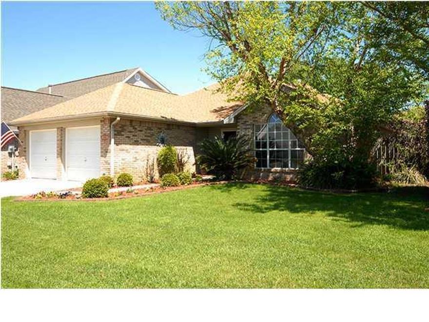 Brick ranch style home with lovely landscaping, pool & screened porch in nice, quiet neighborhood.Open floor plan has large kitchen with stainless appliances including Maytag Gemini dual oven and granite counters and 20'' large ceramic tiles as flooring in kitchen and baths. Large living room with a vaulted ceiling and fireplace. Master bedroom has nice size bath with seperate shower & jacuzzi tub. Ac Unit installed in 2010, water heater installed in 2010, in ground pool and pavers installed in 2011, screen porch installed 2011, new back privacy fence too. Home has an alarm system too. Gas heater for pool and service to the home! Great price for a great location in Destin! All appliances stay including washer & drye
