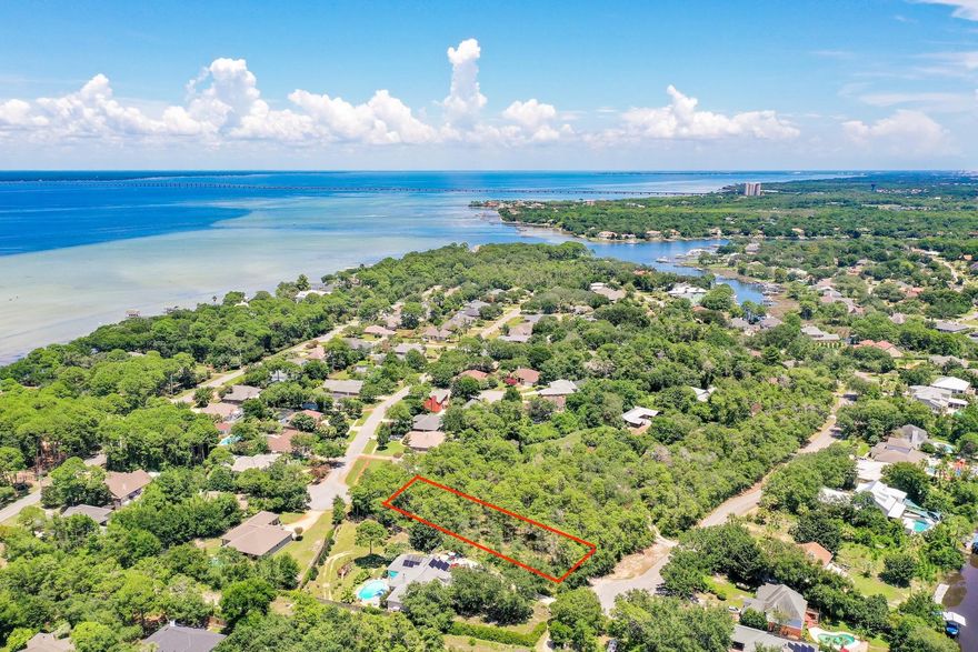 Huge vacant lot ready for a new luxury home, located in one of the most private areas of Destin! This 299 foot deep lot is situated at the end of Indian Bayou North, directly across the street from the bayou in an established and serene corner of Destin. While very private, it's still just minutes away from the beaches, shopping, and restaurants that Destin is famous for. This large estate sized lot will make for the perfect custom home. Buyer to please verify all information contained herein and perform their own due diligence.