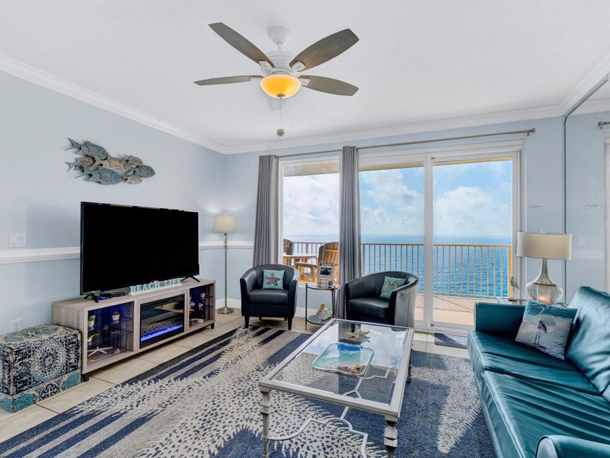 Penthouse Perfection at Treasure Island in East PCB! In a market where condo financials are often the biggest question mark, Treasure Island offers a rare level of confidence. This complex stands out with fully-funded reserves, passed inspections, and a track record of ZERO special assessments in at least the five years of the seller's ownership. The association just had an HOA dues DECREASE as a result of the fantastic management and recent insurance reduction. Additionally, new high-speed elevator installation is underway and the cost is already fully covered by the current budget. As you enter, you'll encounter a fully revitalized interior that is ready for immediate enjoyment. The unit shines with fresh paint and brand-new coastal furnishings that perfectly capture the relaxed beach atmosphere. You will appreciate the durability and cleanliness of having tile flooring throughout (no carpet!). It has been a pet-friendly unit but it's so clean you wouldn't even know it. The bathrooms have been updated with stylish new vanities and even have special pull knobs to accent the beachy vibe. There are built-in bunks behind the dining area that have cute porthole decor and give the unit more sleeping space in addition to the two spacious bedrooms. The kitchen features a new white refrigerator and built-in microwave. Plus there's a new washer/dryer and HVAC system for year-round comfort and peace of mind. The current owners have been incredibly happy with the complex, praising the onsite rental management and the proactive Board of Directors for making ownership easy and profitable. It is a proven performer, grossing $45k in rental income in 2025. It has potential to be even stronger, but the owners have wanted to enjoy the unit themselves as well. And who could blame them with a unit like this! The complex is pet-friendly for owners and also allows renters to bring one dog under 30lbs, a rare feature that significantly boosts rental demand. Complete with an assigned covered parking spot and located next to Schooners Restaurant on one side and St. Andrews State Park on the other, this is the total package. Whether you are looking for a primary residence, vacation getaway, or a high-performing investment, this penthouse is ready for you. Schedule your showing today - a video tour is also available