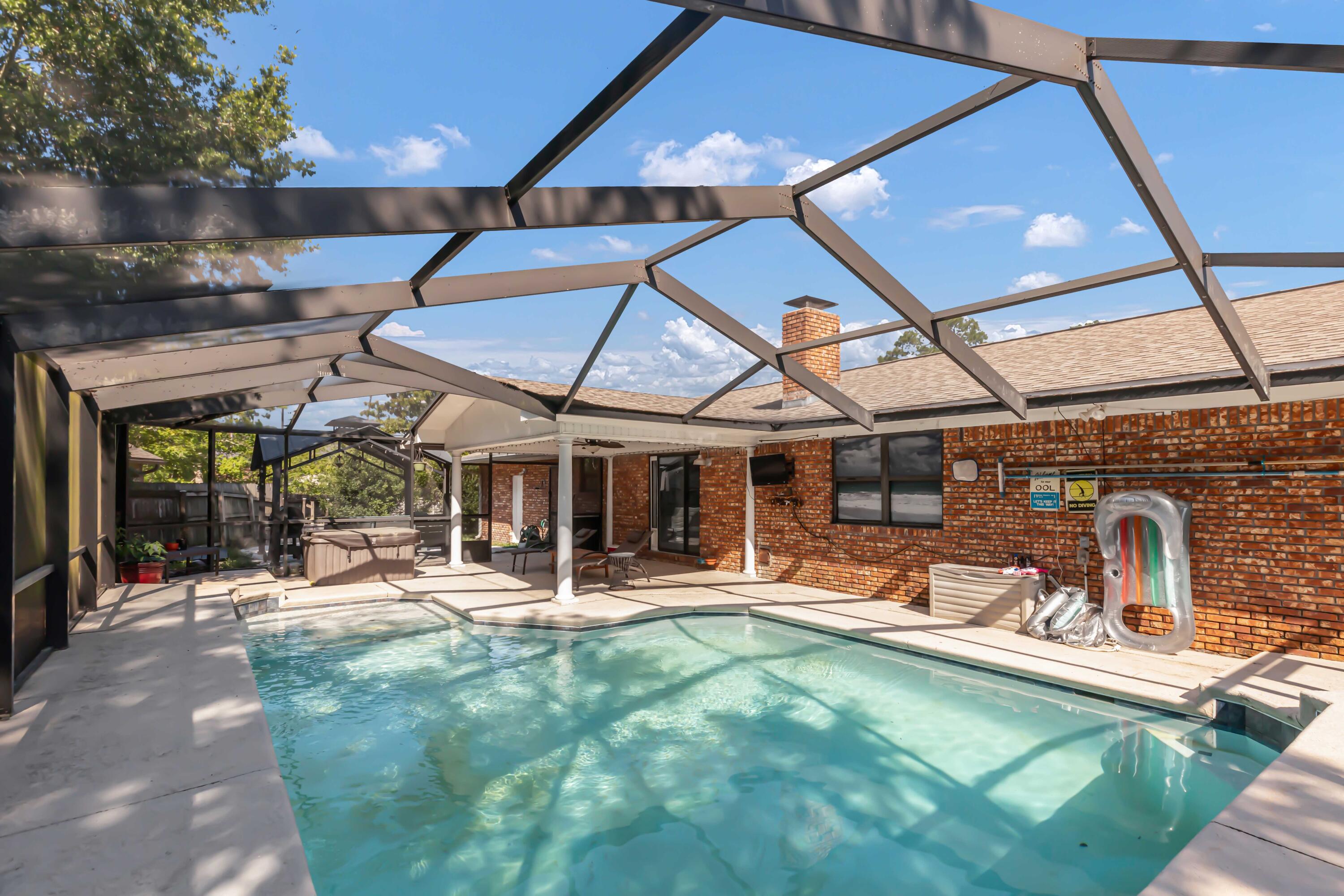 NEW HVAC! $10,000 in anyway money...and it has a POOL! There are lots of memories to be made here! Whether you're taking a refreshing dip in the pool, unwinding by roasting marshmallows in the crackling firepit on cool evenings or hosting unforgettable gatherings made possible by this fantastic outdoor space. Inside, brand new flooring flows seamlessly throughout the home, creating a modern and stylish feel. The dining area boasts a dramatic trey ceiling, adding a touch of elegance and the open floor plan keeps the fireplace in sight adding a touch of ambiance and warmth for memorable meals. This delightful Niceville home is Florida living at its finest! Call us to see it