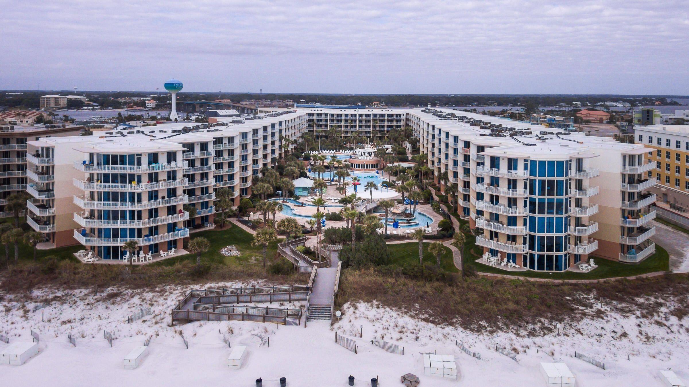 Waterscape your one stop resort directly on the gulf. Beach style lagoon pool, lazyriver, multi water features, 2 hottubs, heated pool, toddler area, snack bar & 500' of beachfront. Unit c404 overlooks the courtyard area to Gulf. Very tastefully decorated & rental ready makes this a great opportunity to own, rent & enjoy all that Waterscape has to offer. Sleeps 10 in this2BR 2BA w/bunk area unit. Granite countertops, stainless appliances, crown molding complete the package. The following were replace over the past few months. Refrigerator, Mattress , Polywood Patio table & chairs, all faucets, most light fixtures, both baths had new tile accents added & various furnishing replaced over this same time. The unit is tiled throughout & was repainted in '21. Seller intends to do a 1031Exchane