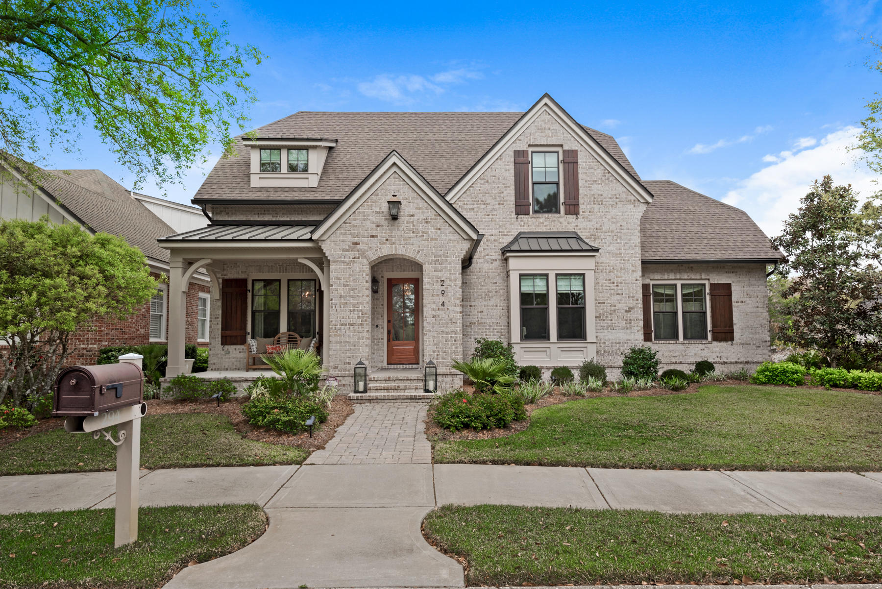 This immaculate 5 bed 4 bath home shows like new and features Boral Marsh Pointe Brick, with covered porches and blends timeless architectural details with today's standards; including the use of impact resistant windows and doors that are designed to withstand 150 mph wind loads.  The home features high end finishes and appliances and  is situated in the beautiful, serene oasis of Kelly Plantation with it's many amenities incl golf, tennis, owners club, stables and much more.  Built with entertaining in mind it has a  butlers pantry  between the gourmet kitchen and dining room. The home was built to exceed industry energy efficiency standards utilizing the StoGuard, weather tight house wrap, foam insulation and a whole house dehumidifier for comfortable year round living