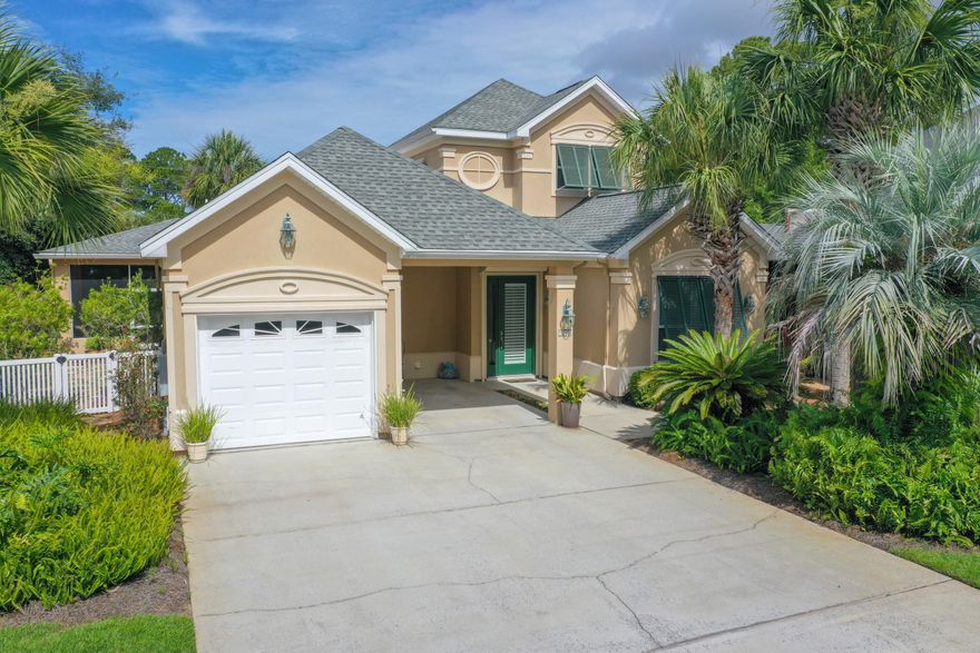 This 3BR/3BA home is located in the highly coveted and secluded Fairway Villas neighborhood and offers a spacious open-concept floor plan. Desirable features in the home include porcelain tile in the main living areas & bamboo flooring in the bedrooms; granite countertops & stainless appliances in the kitchen; shower with seamless glass doors, granite countertops & large master closet in MBA; upgraded lighting; gas fireplace; built-in bookcases; plantation shutters; tankless Rinnai; hurricane shutters; and oversized one car garage. New roof in 2017. You will LOVE the privacy of the large screened porch and outdoor patio area. Lots of  natural vegetation in the backyard. Next to the SRB golf course and only a short distance to the beaches, shopping & restaurants. No Short Term Rentals.