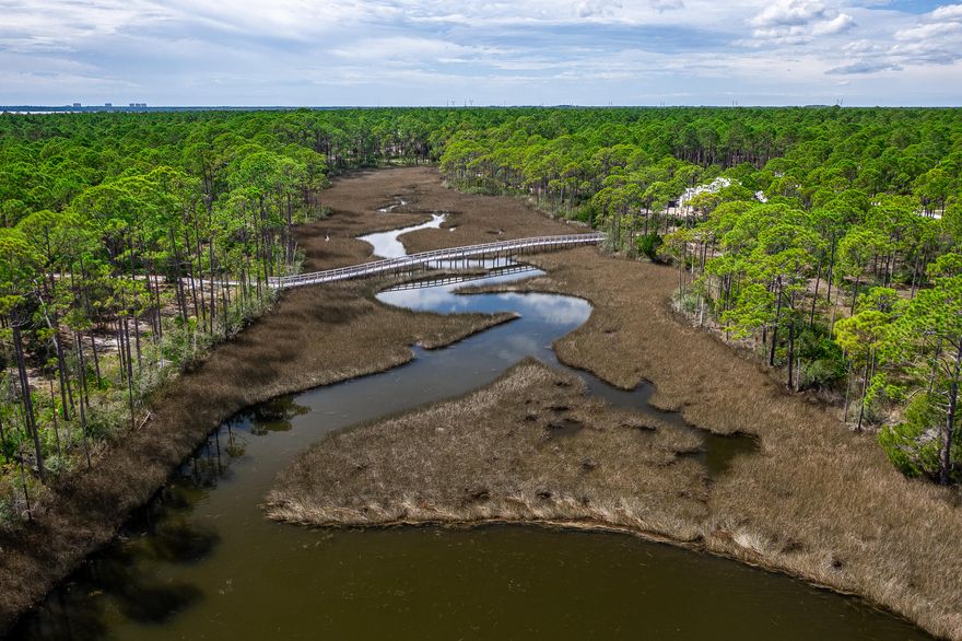 This is the perfect opportunity to build your dream home on a quiet cul-de-sac! Rivercamps is a quaint neighborhood nestled between the Intracoastal Waterway, Crooked Creek and West Bay. This gated community has so much to offer. Linked by extensive trails and boardwalks, the RiverCamps community offers outstanding amenities such as the RiverHouse swimming pool, grill and pavilion, fitness center and a boat ramp on the Intracoastal that leads to the Gulf of Mexico.