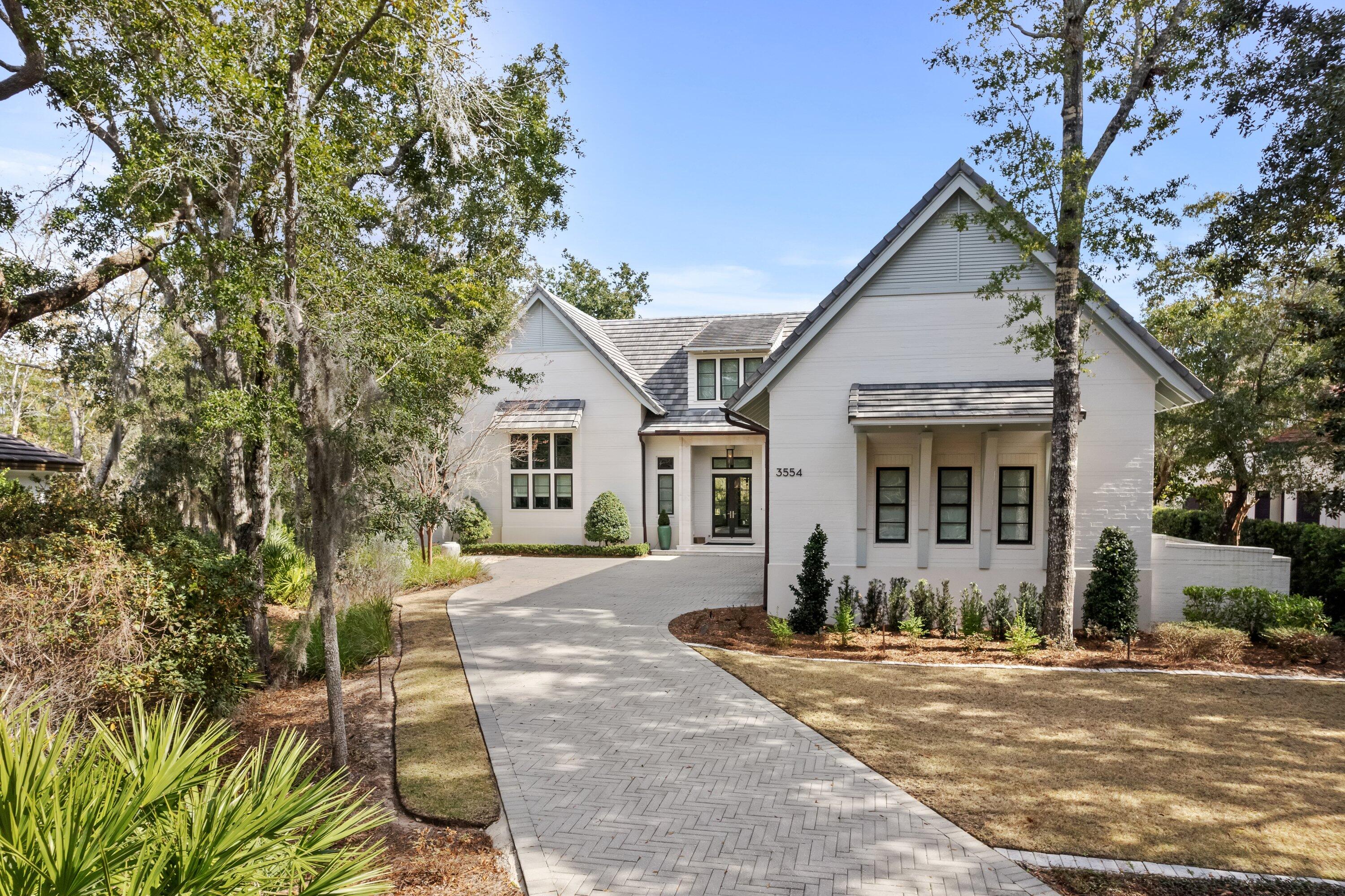 STUNNING 4 BEDROOM 4.5 BATH HOME IN BURNT PINE AT SANDESTIN GOLF & BEACH RESORT WITH METICULOUS ATTENTION TO DETAIL. DESIGNED BY RENOWNED ARCHITECT GEOFF CHICK & ASSOC. AND BUILT BY CHASE GREEN CONSTRUCTION. This One of a Kind House sits in PRIVACY Off the Street in the Oak Trees in The Preserve. Vaulted Ceilings with Beams in this Open Floor Plan House. Gourmet Kitchen with Top of the Line Appliances & Pantry Opens to the Dining & Living Room Areas of the home. Retractable Sliding Doors Open to an Immaculate Screened Porch with a Gourmet Summer Kitchen. Private First Floor Main Bedroom with Coiffered Ceilings and 2 Large Walk In Closets. Upstairs has 3 bedrooms 3 Baths Plus a 2nd Living Area and Office. Salt Water Pool Set Amongst the Oak Trees, 3 Car Garage & Full House Generator.