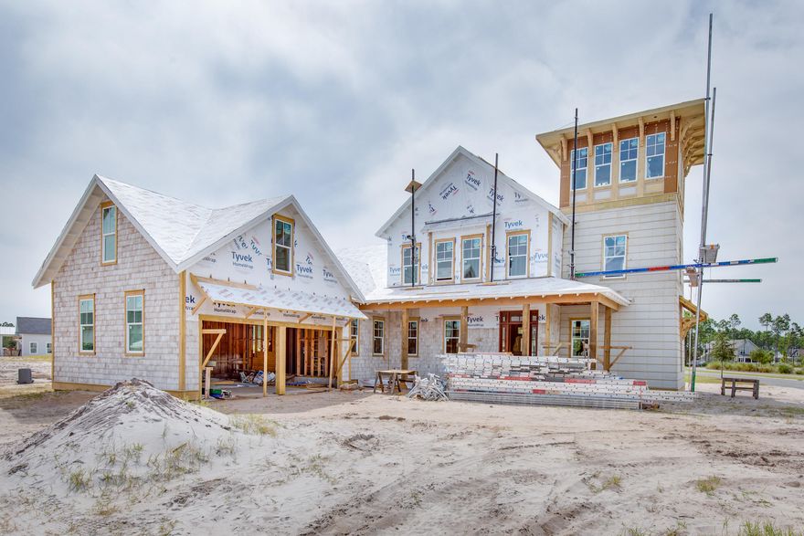 The Watchtower Plan, New from Dune Construction, sits on a large corner lot at the entrance to the Stillwater neighborhood. This 3,843 SF home showcases a unique third floor viewing tower and features many high end finishes including a  fully-equipped kitchen, great room, and dining room with 11' ceilings, wood beams, gas fireplace, and rounded wall of windows allowing for maximum natural light. The first floor master suite includes a spacious ensuite bathroom with walk-in shower, freestanding tub, massive closet, and direct access to the laundry room. Outdoor living is made simple and relaxing with a private pool, cabana with fireplace, and plenty of covered porches. The second floor includes 3 more bedrooms with a shared den for family entertainment.
