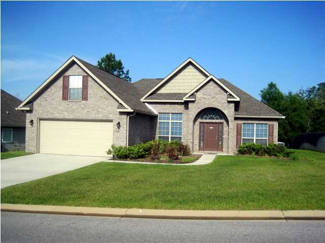 EXECELLANT LOCATION! South of I-10 located in Rolling Ridge Subdivision, an easy commute to Eglin AFB, Duke Field, and 7th Group Special Forces. Since A Great Location Isn't Everything, Look What Else You Get; an enticing 2450 sq. ft., artfully landscaped, all brick, 4 Bedrooms, 2 Bath, Crown Molding, Vaulted/Trayed/Coffered Ceilings, delightfully design, Split Floor Plan Home. There's Formal Dining w/Wood Flooring ,and Formal Living Room or Study/Office/Den accented with arched door ways that add beauty to interior. The fully appliance, Island Kitchen with Breakfast Bar, opens into the Family Great room providing the perfect setting for family activities and relaxation. Laundry and 2 Car garage are conveniently Located to the Kitchen. Wall to Wall Capet plus Walk-in closets in all . . .