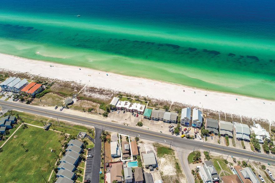 Ideally located on Front Beach Road and less than 5 minutes away from Rosemary Beach and 30A, this home boasts unobstructed gulf views from both the second and third floors. This home features four bedrooms and three full bathrooms and is perfectly set up for vacation rental. The interior features crown molding, fireplace, 9 foot ceilings, and more.