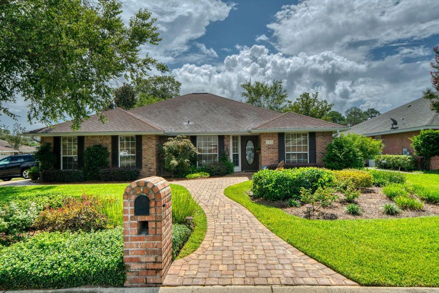 Lovely one owner, Adams built home with 4 bedrooms, 2 baths on a gorgeous landscaped corner lot and culdesac. Located in the desirable Berkeley Forest subdivision, this brick home has mature trees, sidewalk pavers, and a backyard sanctuary with a paver patio and pergola, shed and plenty of room for a pool! Inside, the split floor plan with open living area, cathedral ceilings and fireplace invites you to a beautiful sunroom surrounded by windows allowing you to be a part of the outdoor activities. Spacious kitchen and dining room with stainless appliances, oak cabinets and Corian countertops. Inviting master bedroom and bath with his and her closets. Ceramic tile and engineered bamboo hardwood floors. HVAC installed 2016. Water Heater and stainless steel refrigerator are new in 2019.