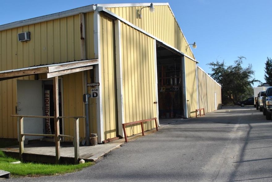 This listing is for two warehouse sections combined (D&E). Section D is 3750 sqft with a small office (360 sqft). It has a lot of built-in storage (684 sqft), two oversized doors (one is 10x8 and another one is 20x14), and two restrooms. Section E is an open warehouse with one oversized door (7x14) and one restroom.
Water, sewer, and garbage are included in the rent.