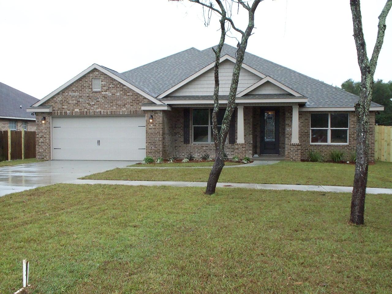 GORGEOUS NEW 1 STORY ALL BRICK - in DESTIN. Perfect Location. 4th BR could be an office or study being separated from other add'l BR's. Master Suite on opposite end of add'l bedrooms. Glass shower enclosure in Mastr BA. Garden Tub separate from shower unit. Separate toilet room with window. Treyed ceilings in Mstr BR, LR, DR. Crown molding in living area. Lau room large enough for a freezer. All stainless steel appliances. Gas range with commercial grade stainless steel hood. All wood self closing cabinets. Granite tops thru out. Chandelier fixture in DR. Recessed lights in Kitchen & LR. Pendant lights over raised snack bar. Rinnai Tankless WaterHeater. Trane AC/Heat with return air systems in all BR's. Flooring is: Porcelain tile, carpet & laminated wood. CLICK MORE.