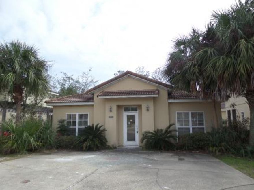 This charming 3/2 home in the gated Tuscany community has lots of potential. It is a one story home with a split floor plan, SS appliances, tile floors in the main living areas & baths, custom closet built ins, & a cute fenced back yard. Conveniently located just a short walk from the community pool and a few minutes from everything else, including the beautiful beach! The home does have damage from flooding caused by rain in April 2014 and it needs work, but could be a perfect opportunity to make this great community your home.