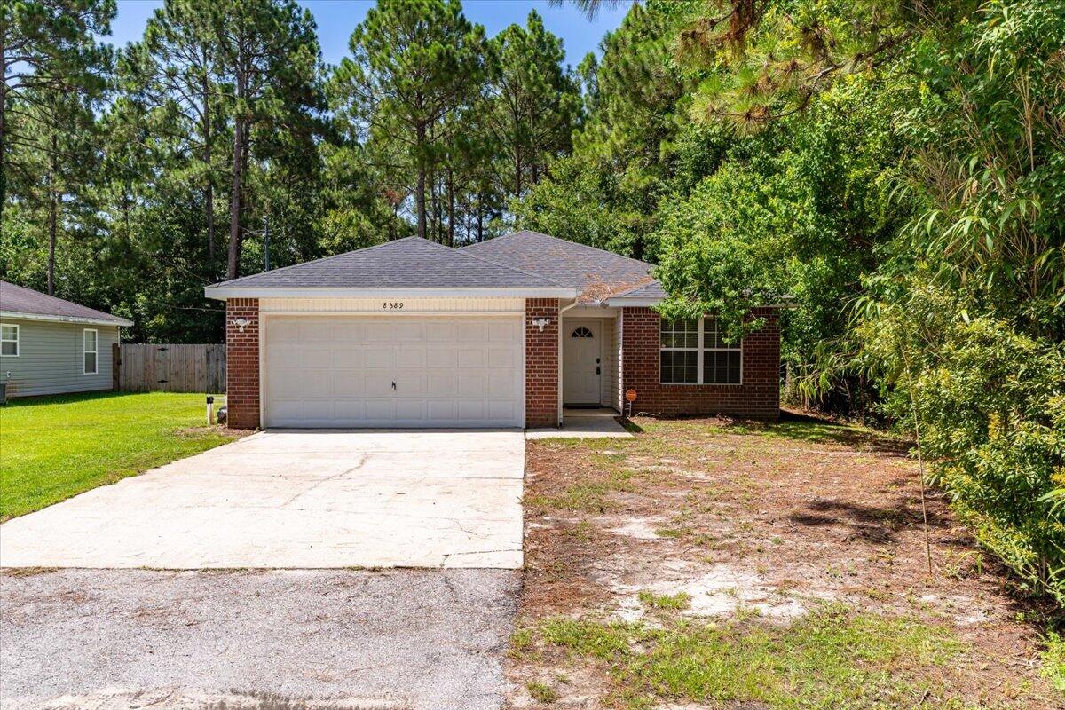Welcome to 8389 Tavira St. A cozy 3 bedroom, 2 bath home located in Navarre, Fl. This home is the ideal blend of affordability and convenience with NO HOA fees! Just minutes from the stunning emerald coast, this home is a fantastic option for families and an incredible opportunity for investments. This home is the perfect place to come in and make your own!