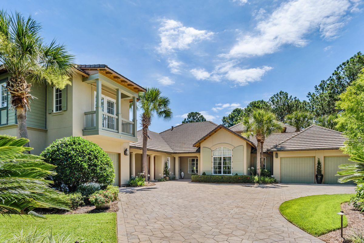 Perfectly situated on a large private lot in Burnt Pine, this Parade of Homes wining custom home built by Compass Builders, is located on the 7th fairway of the Raven Golf Course. From the moment you enter you will be impressed with the attention to detail throughout this spacious luxury residence. Whether you are a seasoned chef or weekend bar-b-que master, you will love entertaining with the spectacular gourmet kitchen and expansive outdoor living spaces in a park-like setting. The floor plan is ideal for just the 2 of you or the entire family with two main living areas, master suite, and a guest suite all located on the first floor; while another family and media room with multiple televisions, wet bar, bedroom with full bath, bonus room, and a covered balcony overlooking the fairway