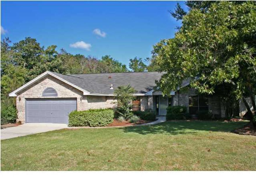 Located in the heart of Rocky Bayou Country Club Estates on a nicely landscaped lot with an in ground gunite pool (can be heated with new gas heater), separate hot tub, and extensive wood decking accented with lush plants and trees.(owner pays for pool service) The tiled foyer opens into a spacious great room with plenty of comfortable family space and a corner gas-starter fireplace. Pocket doors open into the light and bright dining room which can also be used as an office. Tiled kitchen which features raised panel oak cabinets and a large pantry. There is plenty of table space and room for a desk or serving piece in the breakfast area, or enjoy meals in the Florida room--the room with a VIEW! Rest and relax