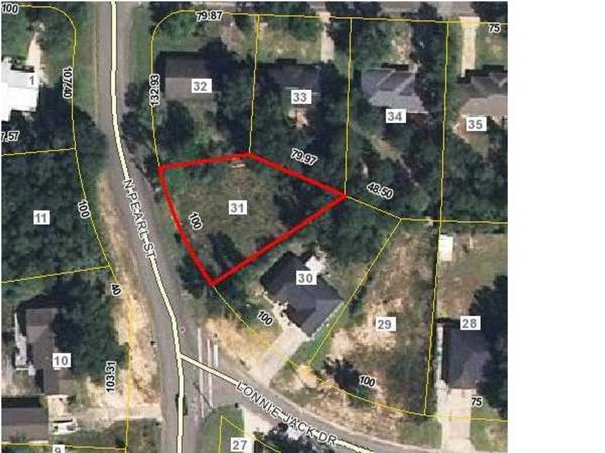 Conveniently located close to schools and shopping. Vacant lot ready to build your home. Water and sewer are available. This is one of 3 lots that are available, with sewer available to the lots on the north side of the street. This lot is on the east side of Pearl St & the north side of Lonnie Jack. Please verify availability of utilities, schools, and any other information that is important to you. Listing Agents and owners are licensed real estate professionals. Listing Agents are owners. Listing Broker/Salesperson has ownership interest in the property.