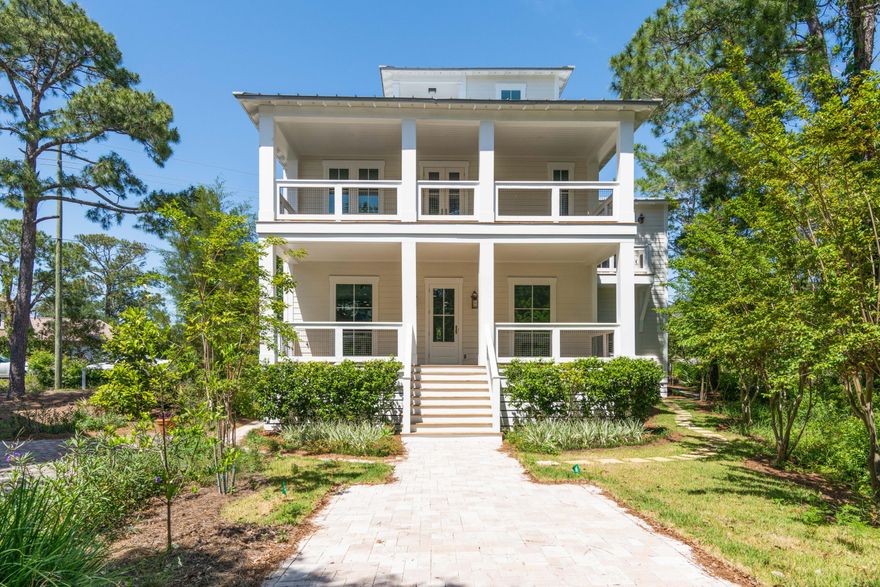 Rare opportunity to own this 5 bedroom, 5 1/2 bath, high end home just steps to the Dune Allen Beach. Situated on a quiet cul de sac in the gated community of Calypso Pointe.  This home was fully rebuilt and redesigned in 2021/2022 featuring all new Hurricane impact windows and doors, new walls, ceilings, can lights and hardwood floors throughout. Both HVAC units and tankless water heater are new. New sheet rock on walls and ceilings throughout and new hard wood floors. This home has never been lived in since its transformation.  All bathrooms and plumbing are new and designed with high end tile and fixtures. The main floor features an open living concept with gas fireplace, huge kitchen and bar, half bath and with one bedroom ensuite bath and large walk-in closet. Kitchen features all new