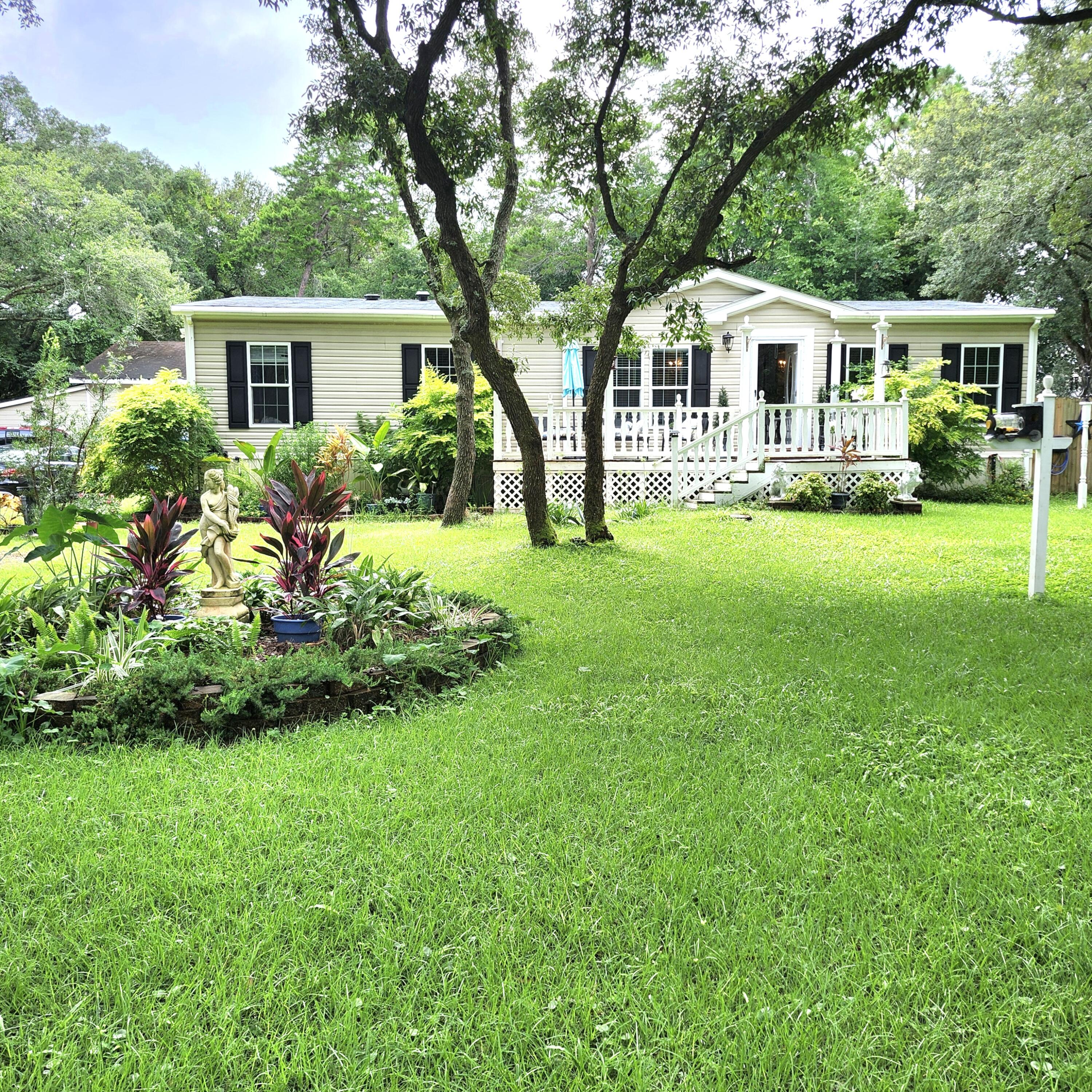 Unique property on .6 acres in the heart of FT Walton Beach. You'll feel like you're in a park with all the lush landscaping and beautiful serenity garden. This property has so much to offer with a separate apartment, gym, artist studio, huge workshop, 2 garages, and a 3 room storage building. Lovingly maintained and very open with a split bedroom plan. Fantastic kitchen with gas stove/oven, soft-close cabinets and pull out drawers, good counter space and island breakfast bar. The master suite features a spacious bath with garden tub, walk-in shower, double vanities and large walk-in closet. The largest of the additional bedrooms has a big walk-in closet. No shortage of storage here. If you're looking for peace and privacy you have to view this property to appreciate it's beauty.