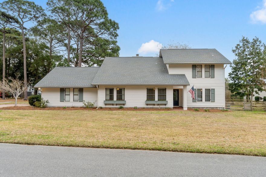 Absolute gem in Bluewater Bay ideally located on green #5 of the Bay Golf Course.  On your arrival you'll be greeted by a spacious paver driveway with plenty of room for your vehicles plus your golf cart, flowering window boxes, mature trees, pond and sunset views, and so much green space.  The outside charm expands inside the home. As you step in you are greeted by an amble sized entry and spacious formal dining room that flows into both the living area and beautiful chef's eat in kitchen.  You will notice thoughtful updates throughout the entire home creating a modern feel, but the kitchen is a show stopper, beautifully remodeled with quartz countertops, coffee station, stainless steel appliances, and a spacious island.