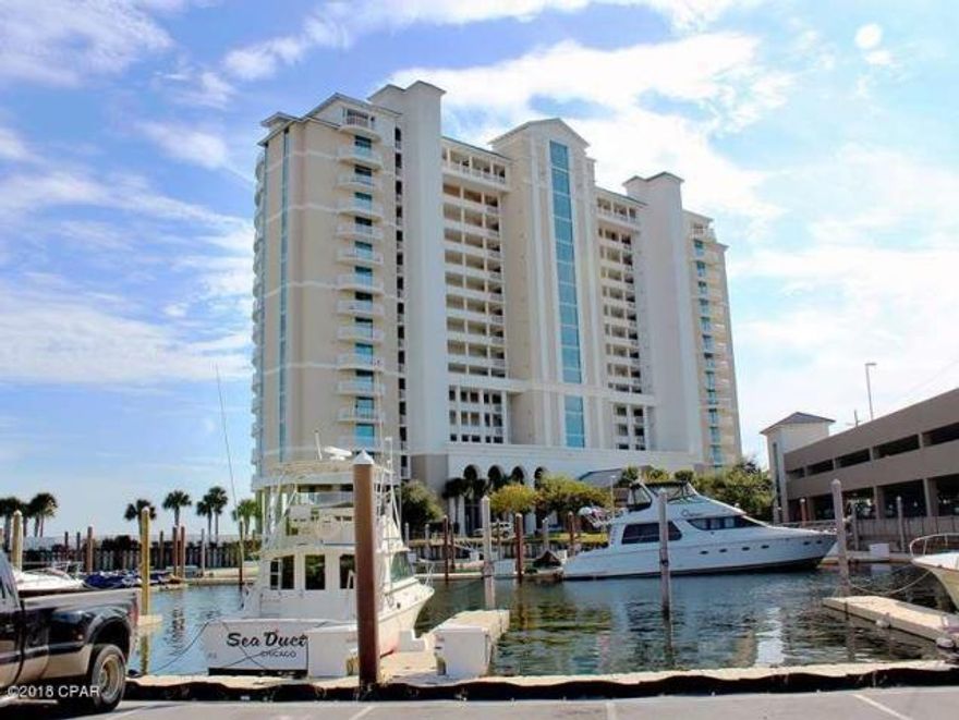 This remarkable Marina Landing two bedroom provides every thing you've ever dreamed of! Marina Landing features floor to ceiling views of the pristine St. Andrews Bay from every room and the expansive 50 foot wide balcony features a stainless outdoor kitchen that provides you with a true outdoor living space that is perfect for entertaining family and friends. The Chef Designed Kitchen offers an abundance of cabinetry, granite counter tops, breakfast bar, stainless steel appliances and full pantry. This unit has twin Master Suites that provides full walk-in closet and full baths. One suite has a luxury master bath with separate shower and extra deep soaking tub great for those bubble baths! This spectacular property has a private deep water marina onsite and is just minutes to the pass