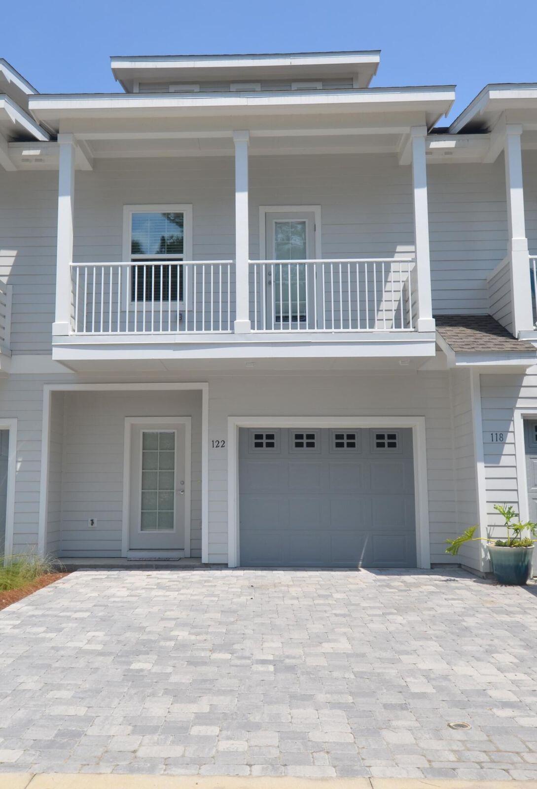 Welcome to this recently constructed townhome in the heart of Santa Rosa Beach, offering unbeatable convenience to shopping, dining, and the breathtaking white sand beaches and emerald waters of the Gulf of Mexico. This well-appointed 3-bedroom, 2.5-bath home is designed for comfort and style, featuring a chef's kitchen with a gas stove, elegant quartz countertops in both the kitchen and bathrooms, and durable luxury vinyl plank flooring throughout.Enjoy ample outdoor green space perfect for relaxing or entertaining, plus access to a sparkling community pool and more. Whether you're seeking a primary residence, a second home, or a reliable long-term rental investment, this Kara Lake townhome delivers on all fronts!
