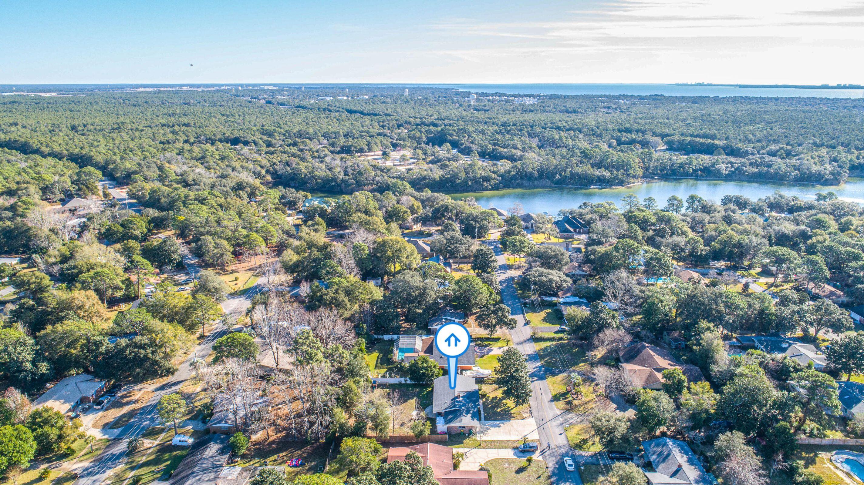 BOAT LOVER'S PARADISE | BEACH ACCESS | FULLY UPDATED FARMHOUSE IN POQUITO BAYOU!Welcome to coastal elegance reimagined--this beautifully renovated single-level ranch-style retreat offers the best of Florida living, perfectly positioned in the coveted Poquito Bayou community with exclusive access to a private neighborhood beach, boat launch, swimming cove, and shaded picnic grounds.Step inside to discover a breathtaking gourmet kitchen, complete with gleaming granite countertops, a custom designer tile backsplash, high-end stainless steel appliances, and a statement vent hood over the range--all flowing seamlessly into a cozy second living space featuring a painted brick fireplace and sliding glass doors that open to your private backyard sanctuary.Read more.... Dream-worthy backyard: Expansive and lush, with room for a pool, a covered patio perfect for alfresco dining, a firepit for moonlit gatherings, and even a swing set for endless fun.
Features you'll love:
Over $20,000 in new, energy-efficient windows
Luxury Vinyl Plank (LVP) flooring throughout all bedrooms and living areas! No carpet!
Sleek, modern tilework in kitchen, baths, and halls
Oversized driveway with space for a boat or RV
Large indoor laundry room with ample storage
Copper wiring and major systems updated:
-New roof & water heater (2017)
-New HVAC (2019)
-Complete New attic insulation (2019)
Low utility bills!
And the cherry on top? Your neighborhood offers direct access to Poquito Bayou is THE ideal for fishing, kayaking, swimming, and weekend picnics beneath the oaks. This one has it all: style, space, and salt air.
Poquito Bayou | Minutes to Eglin AFB, top-rated schools, playgrounds/parks and the emerald waters of the Gulf
This is more than a home- it's a lifestyle. Schedule your private tour today.