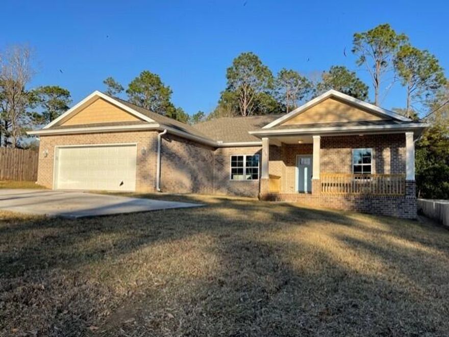 NEW CONSTRUCTION in the HEART of Crestview! 2022 build - 4 bedroom 2 bathroom all brick Craftsman home on a LARGE 0.31 acre lot. This home is an open concept - split floorplan design that buyers have come to expect. As you enter the home, the entry way leads to a huge living room with vaulted ceiling. Spacious kitchen with white shaker style cabinets with granite counter tops, pantry, and stainless steel appliances. Mstr bedroom has tray ceiling. Mstr bath with double granite vanity, linen closet, tiled shower, and soaker tub with tile back splash. Home offers 3 additional large bedrooms with a private hallway and hall bath. Ceiling fans and nice light fixtures throughout home, luxury vinyl wood plank flooring throughout the entire home! Indoor laundry room. Nice covered front porch with