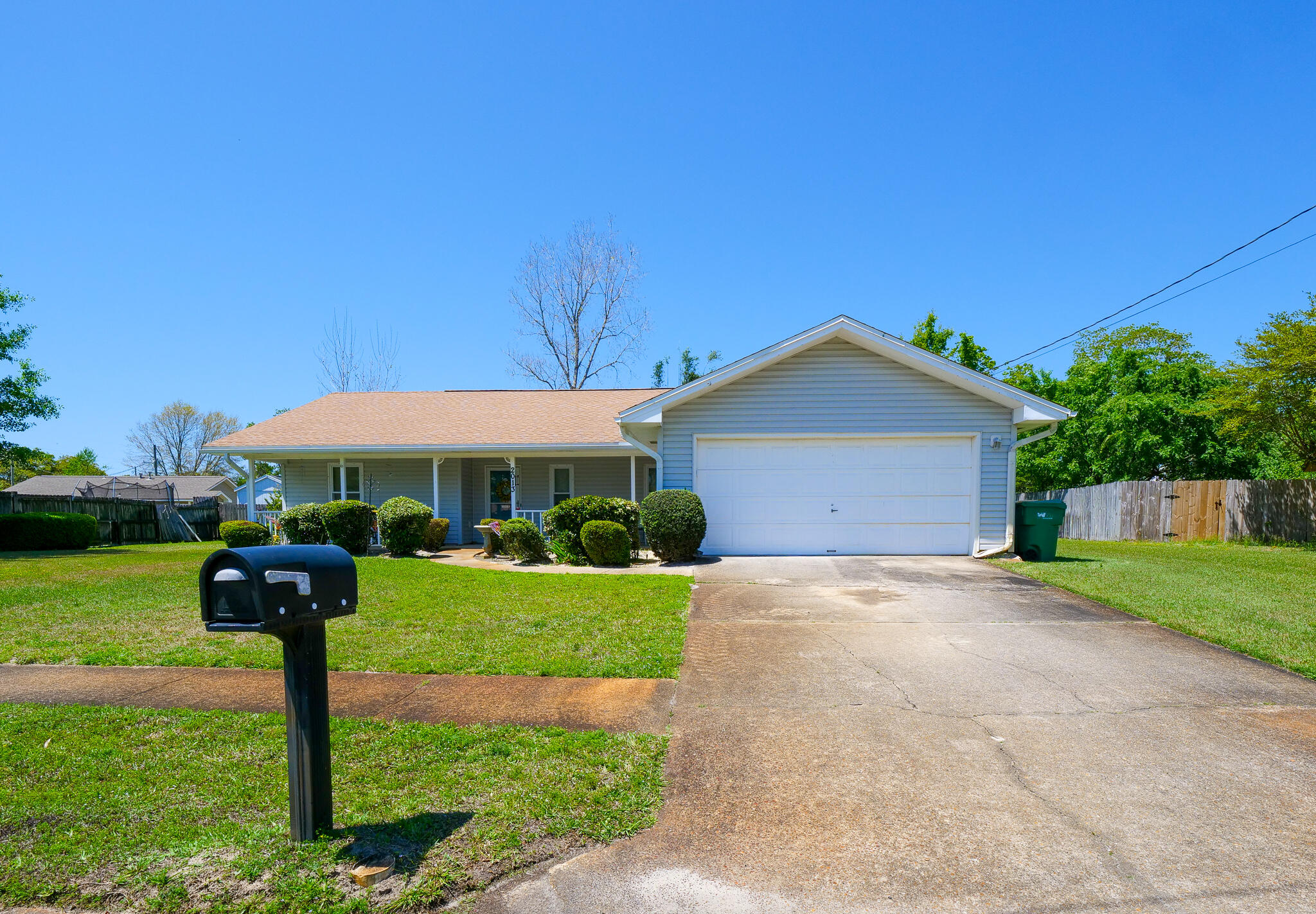 *New roof to be installed prior to closing. Brand new water heater. Great split floor plan home just west of Hurlburt. Spacious great room with vaulted ceilings and fireplace. Two car garage, covered front porch area, and screened in covered back porch.
