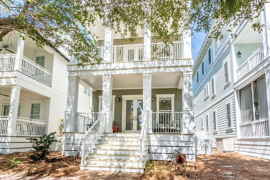 Whether your dream beach cottage is an investment, primary or second home, look no further. Sunshine is the theme here as light streams through windows and on the decks on each floor. Enjoy privacy yet accessibility of this location within the gates of the prestigious Carillon Beach community, boasting nearly a mile long of white sandy beach on the Gulf of Mexico. The first-floor kitchen with great room and third level grand wet bar/living area both open to broad decks that will foster many family gatherings. Beautifully appointed with stainless appliances and granite counters, every convenience is provided. Crisp white walls and warm pine floors are found throughout. For convenience, the first floor offers a bedroom with full bath. The second-floor master bedroom enjoys a private deck