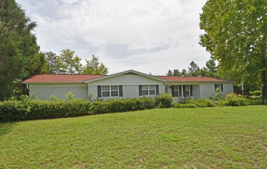 5 ACRES with a 2,787+ sq.ft. home! Seller is providing 1 YR Home Warranty and Offering to pay MOST Closing Costs! Multiple Outdoor Buildings and Carports for all your Equipment and Toys! Property has Access from Airport/Garden City Road just North of the home at 6034 Garden City Road. Home Features 2 MASTER SUITES with an Office. Additional Room off the patio has possibility of a 3rd Bedroom. Tile Flooring throughout the home w/Laminate Wood Flooring in the Master Suites, Office and Dining Area. Spacious Living Room features a gas fireplace w/brick surround. Kitchen features Stainless Steel Appliances with Double Ovens and plenty of Cabinet Space. Powder Room is conveniently located off the Kitchen next to the French Doors for access to the Florida Room. ENJOY the view of your 5+ ACRES