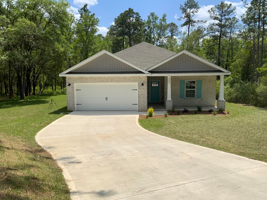 Beautiful new home in Grandview Heights Subdivision, lake and park privileges with affordable HOA.  Sitting on a quiet cul-de-sac location near the park entrance, 1587 SF with covered front porch, rear patio, 2 car garage. Split BR plan with 9' ceilings thru-out, quartz countertops, double vanities in master bath, Luxury Vinyl Plank in common areas, carpet in bedrooms.  Kitchen has stainless steel appliance package, pantry, work island with bar seating.  Oversized lot has some wetlands in the rear.  See attached site drawing, estimated completion date is end of April/first of May.