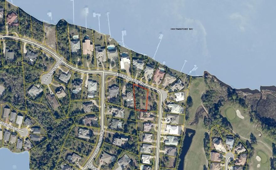 Build your dream home on this large vacant lot in the gated Emerald Bay Subdivision; a prestigious Golf Course community centrally located long the shores of the Choctawhatchee Bay, located between Destin and the beaches of South Walton.
The upscale golf community of Emerald Bay is located in a highly desirable location near Destin Commons and Grand Boulevard, outlet mall shopping, Destin and South Walton beaches, and close proximity to other prestigious golf courses such as Kelly Plantation, Regatta Bay, Sandestin and the Raven.
While Destin itself is recognized as one of Florida's top golf destinations, Emerald Bay Golf Club seems to be one of those courses, often overlooked, rarely crowded, that offers an experience not found anywhere else on the Emerald Coast. Designed by Bob Cupp, Emerald Bay is an 18 hole championship course that is, one of Florida's best-kept secrets. In 2014, the Emerald Bay golf course underwent a complete renovation. The recently renovated Clubhouse features a full-service golf pro shop as well as "The Grille" which offers a delicious menu, Full Bar, indoor dining and an outdoor covered porch with fireplace overlooking the 18th green. In addition to the world-class golfing opportunities, Emerald Bay offers a wonderful residential community with access to the community swimming pool as well as two Rubico tennis courts. This prime lot has undergone a recent FEMA Letter of Map Ammendment(LOMA); therefore, owner is eligible for lower flood insurance premiums or the option to not purchase flood insurance.